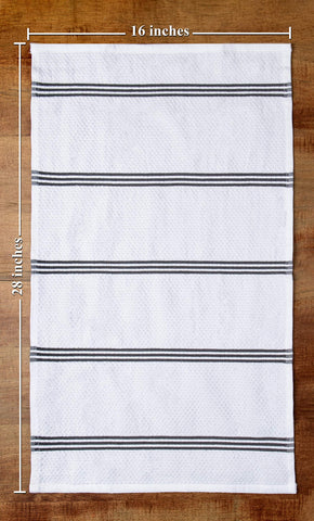 Sticky Toffee: juego de cuatro toallas en gris y blanco para decorar la cocina.