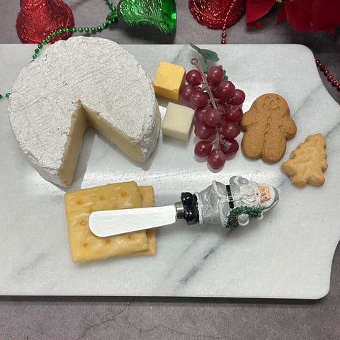 Spreaders Supreme Housewares con Santa Claus, ideales para servir crema de queso en fiestas.