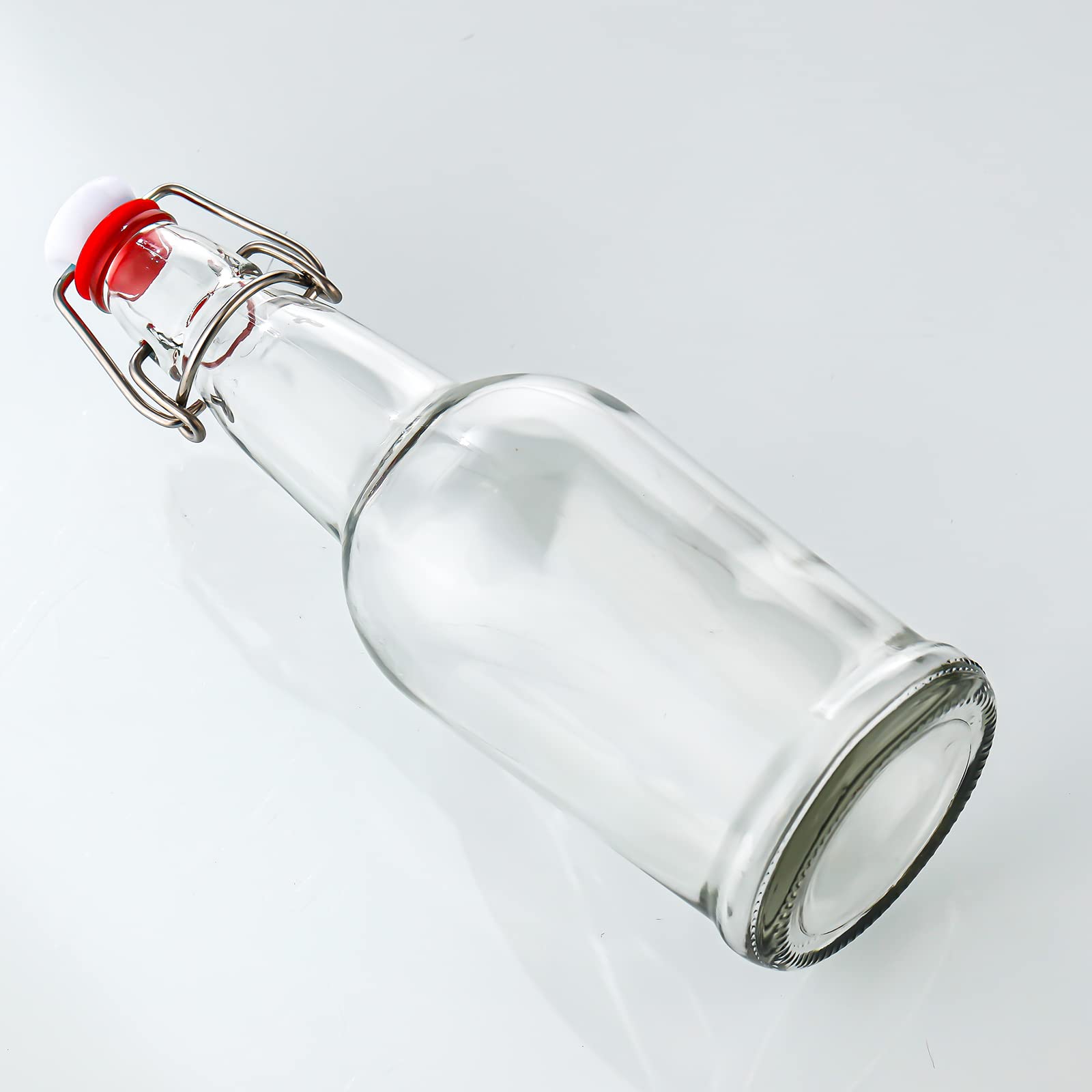 Conjunto de seis botellas de vidrio SURESAVE para bebidas caseras.