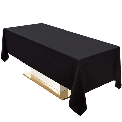 Mantel negro Surmente 60x102 sobre mesa rectangular, look elegante.