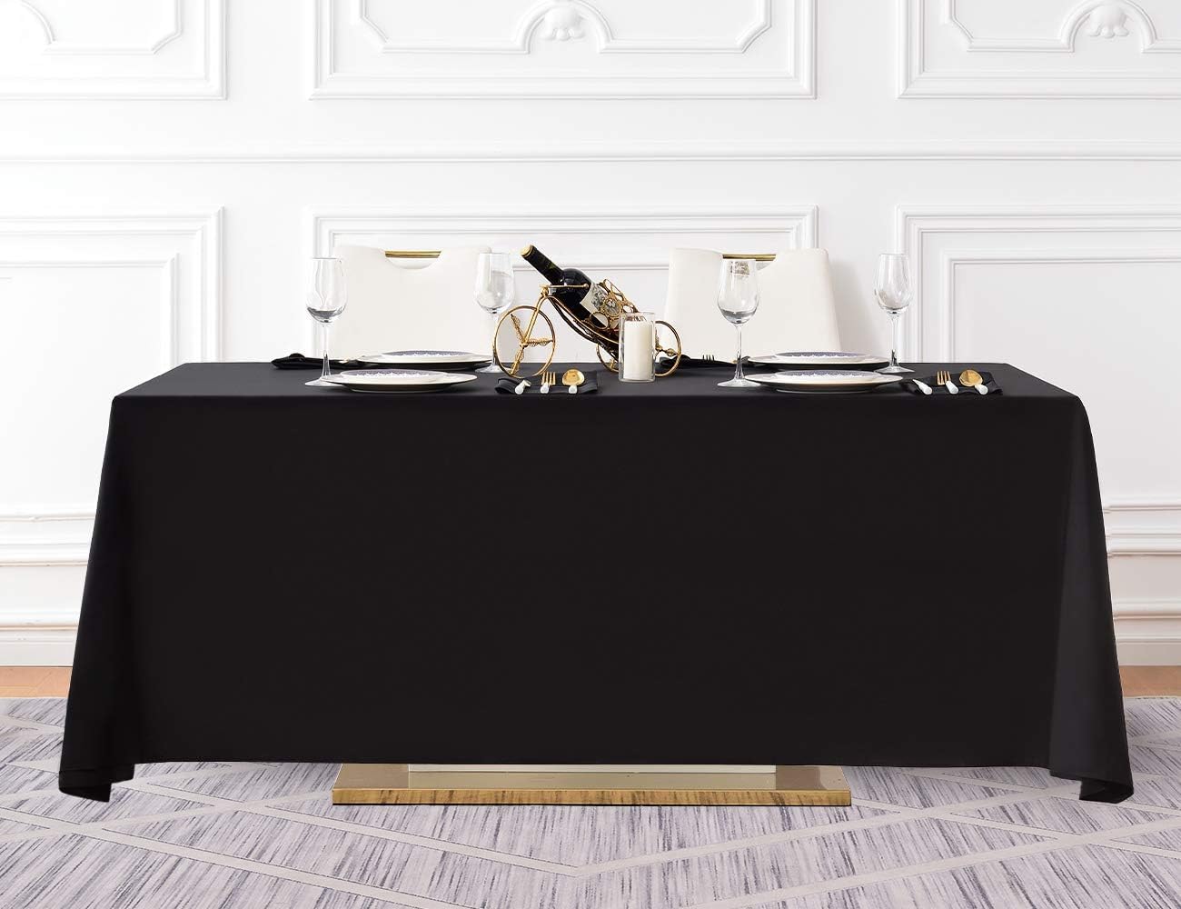 Mantel Surmente negro para bodas con color sólido y presentación refinada