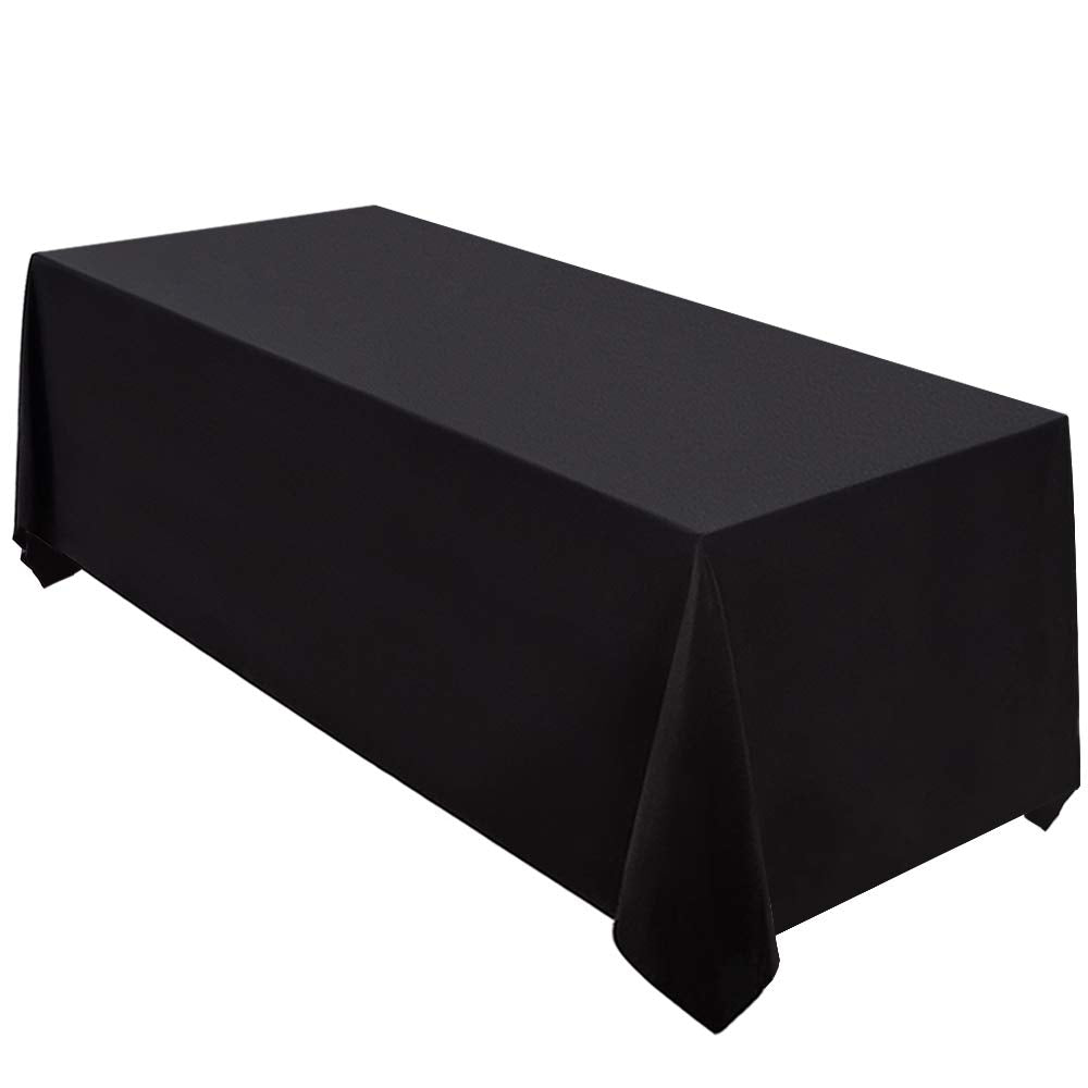 Mantel negro Surmente de 90x156 para mesas rectangulares en eventos.