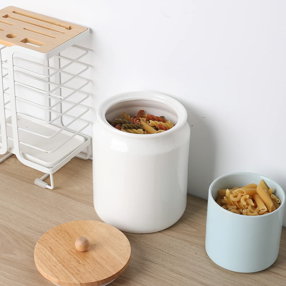 Tapa de madera con pomo esférico de Sweejar para facilitar apertura.