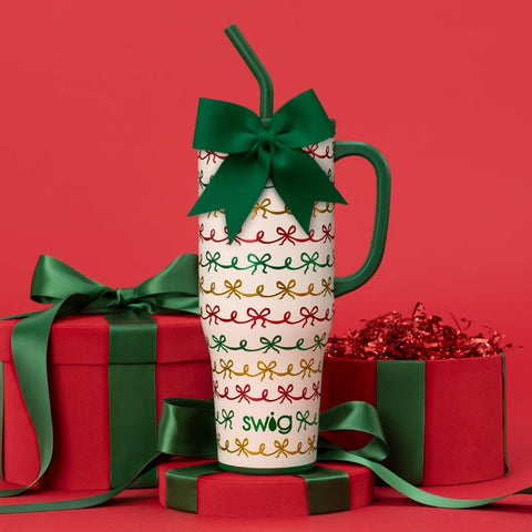 Diseno navideno con lazos brillantes en Swig Life 40oz mega mug.