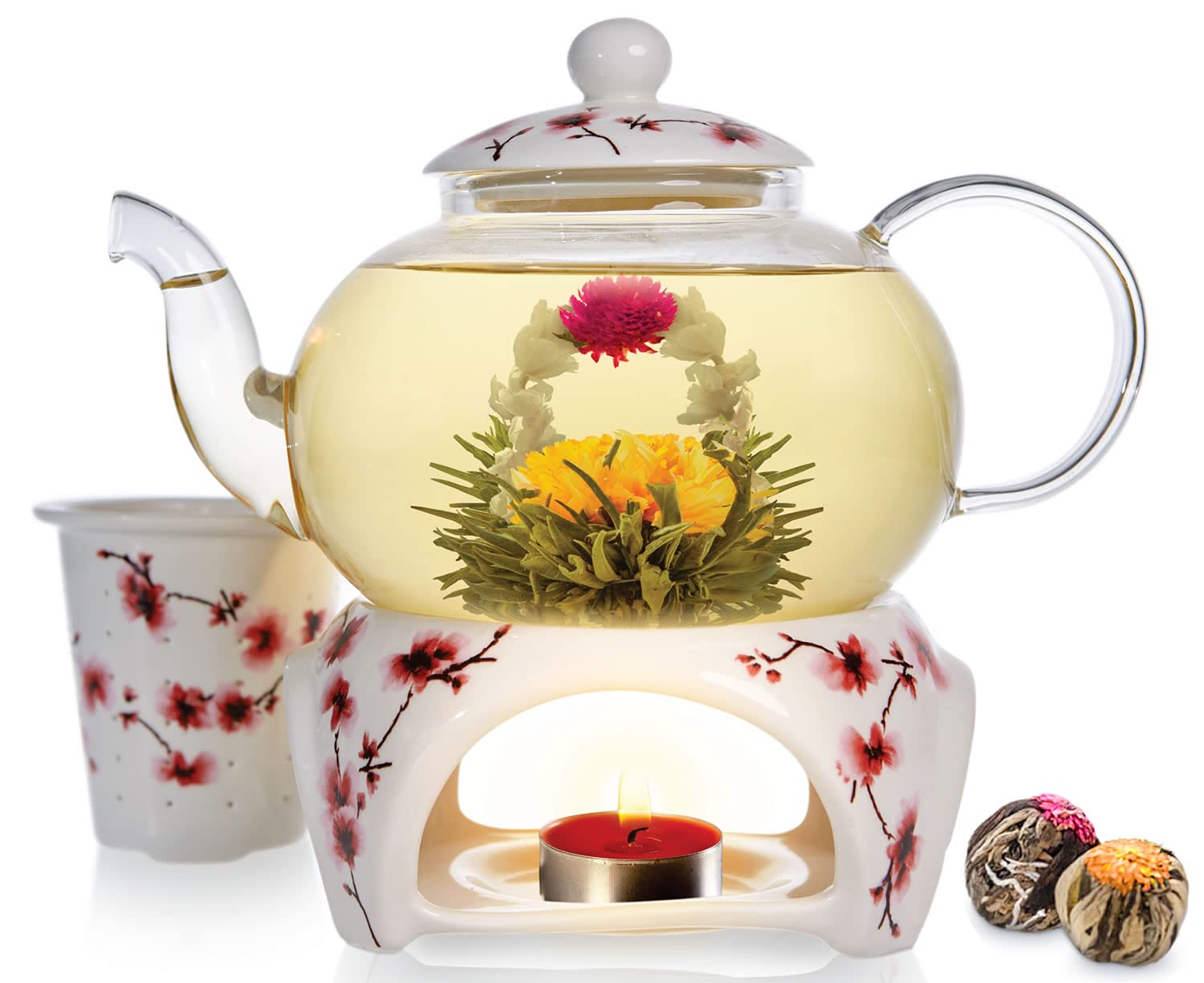 Tetera Teabloom de cristal revelando la floración del té.