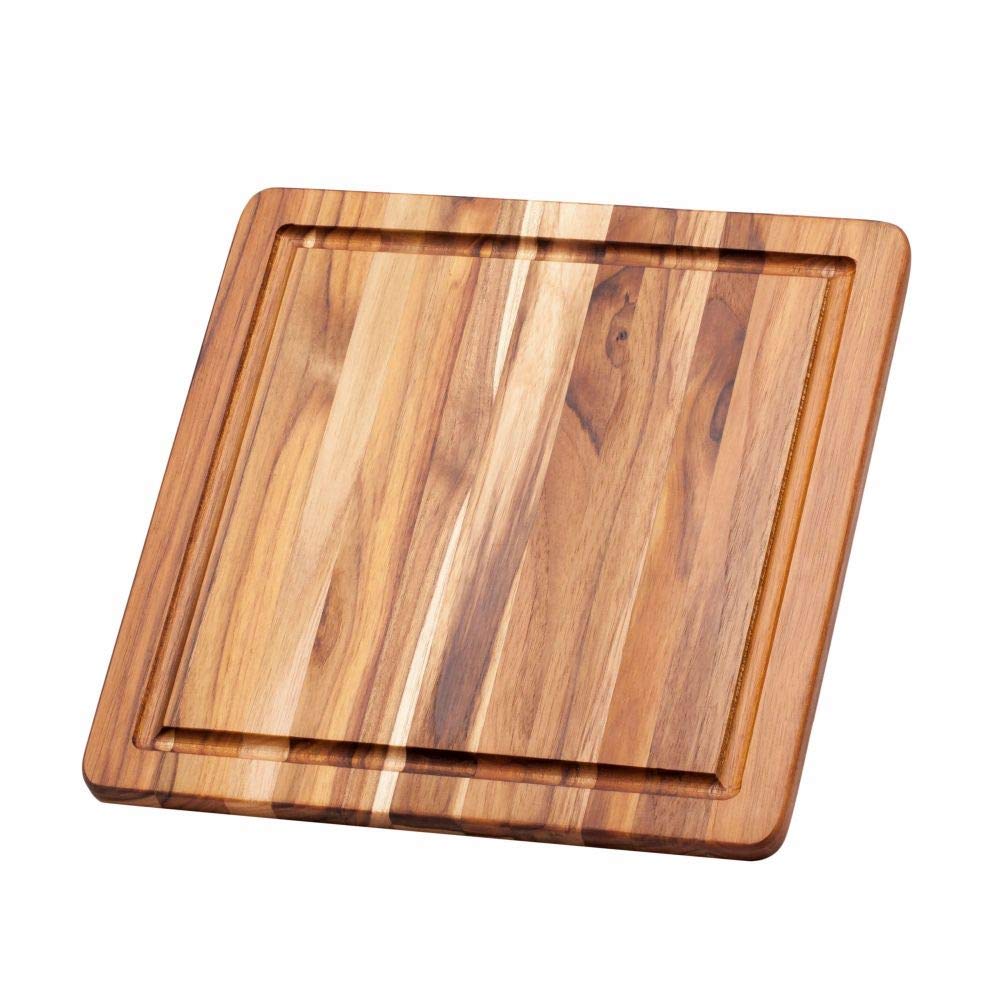 Teakhaus tabla con canal de jugo para recoger líquidos al cortar.