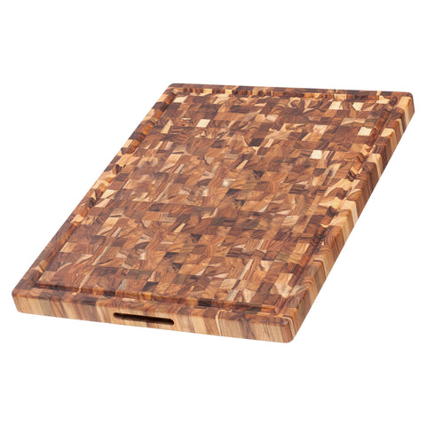 Tabla Teakhaus de teca con grano extremo para cuchillos afilados.