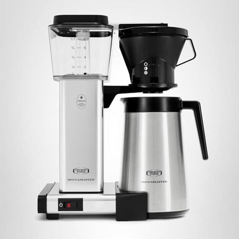Technivorm Moccamaster con tapa de viaje para mantener el café caliente durante el traslado.