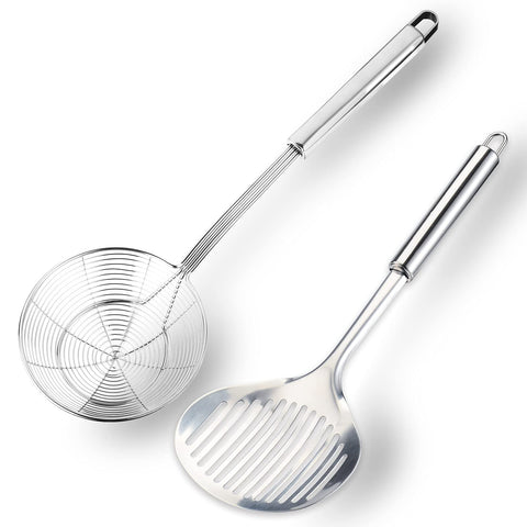 TENTA KITCHEN espumadera ranurada con mango ergonómico para seguridad al manipular líquidos.