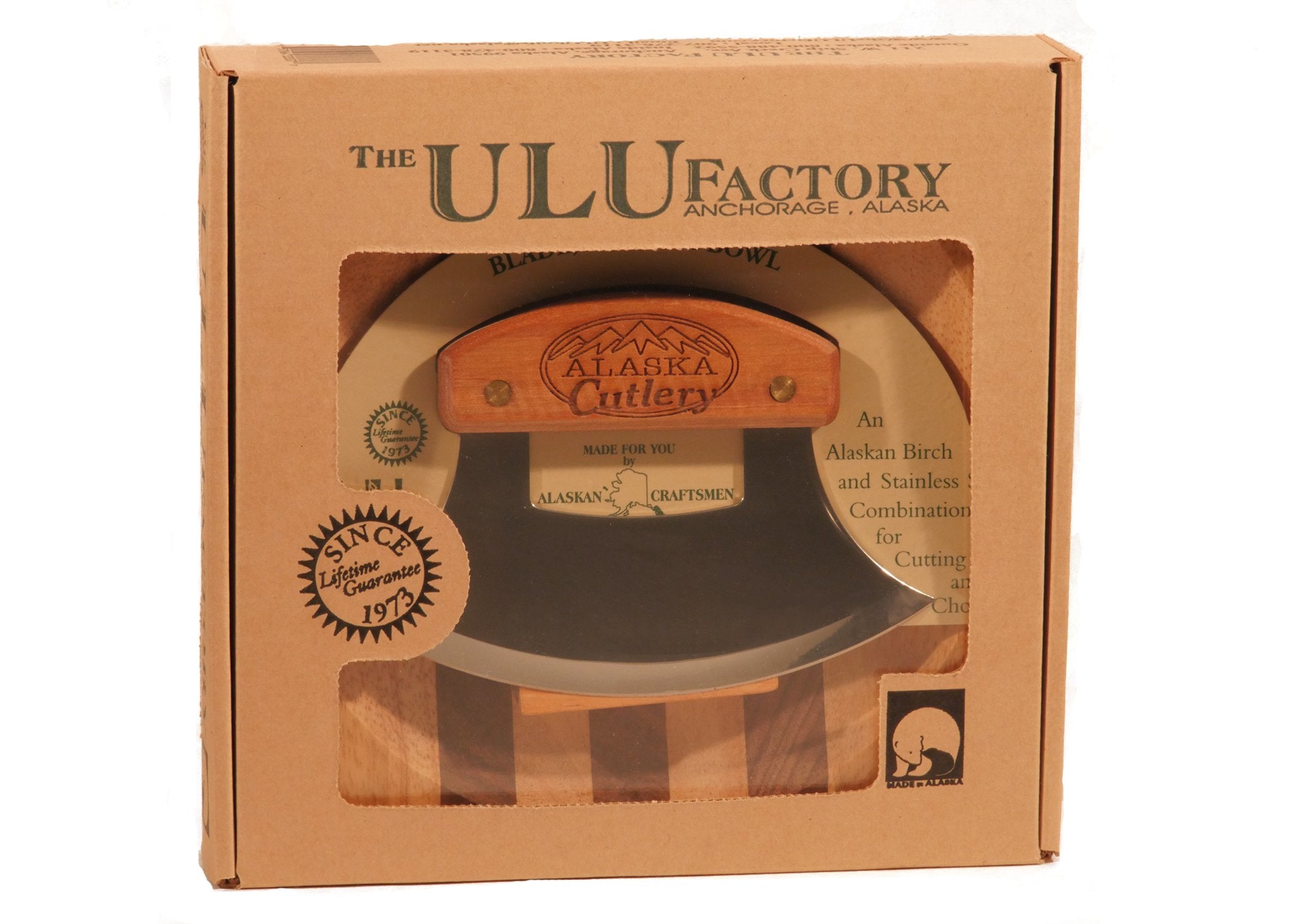 El cuchillo ulu curvo de The ULU Factory con mango de madera ofrece picado preciso.