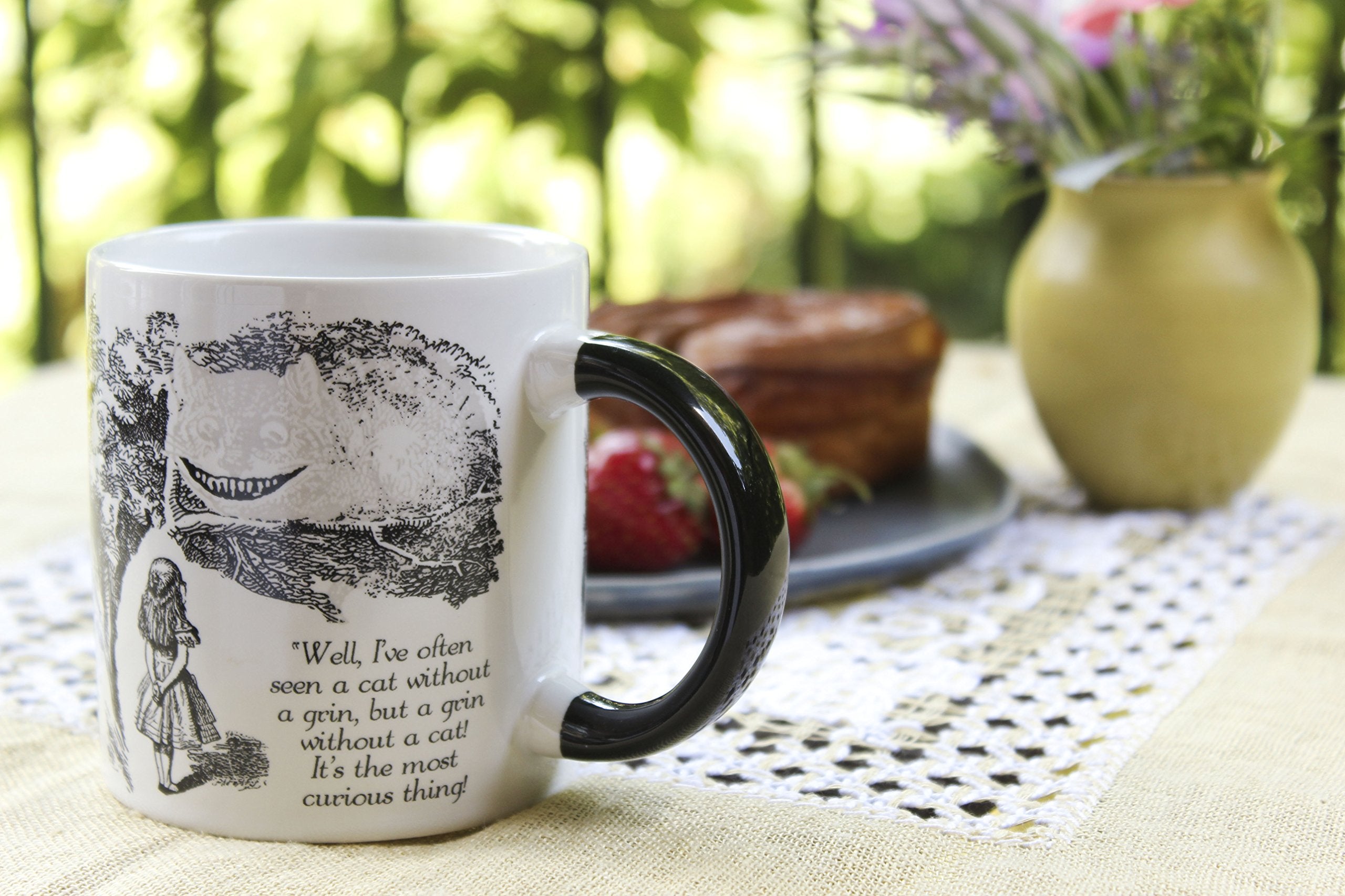 The Unemployed Philosophers Guild taza con diseño colorido y atractivo.