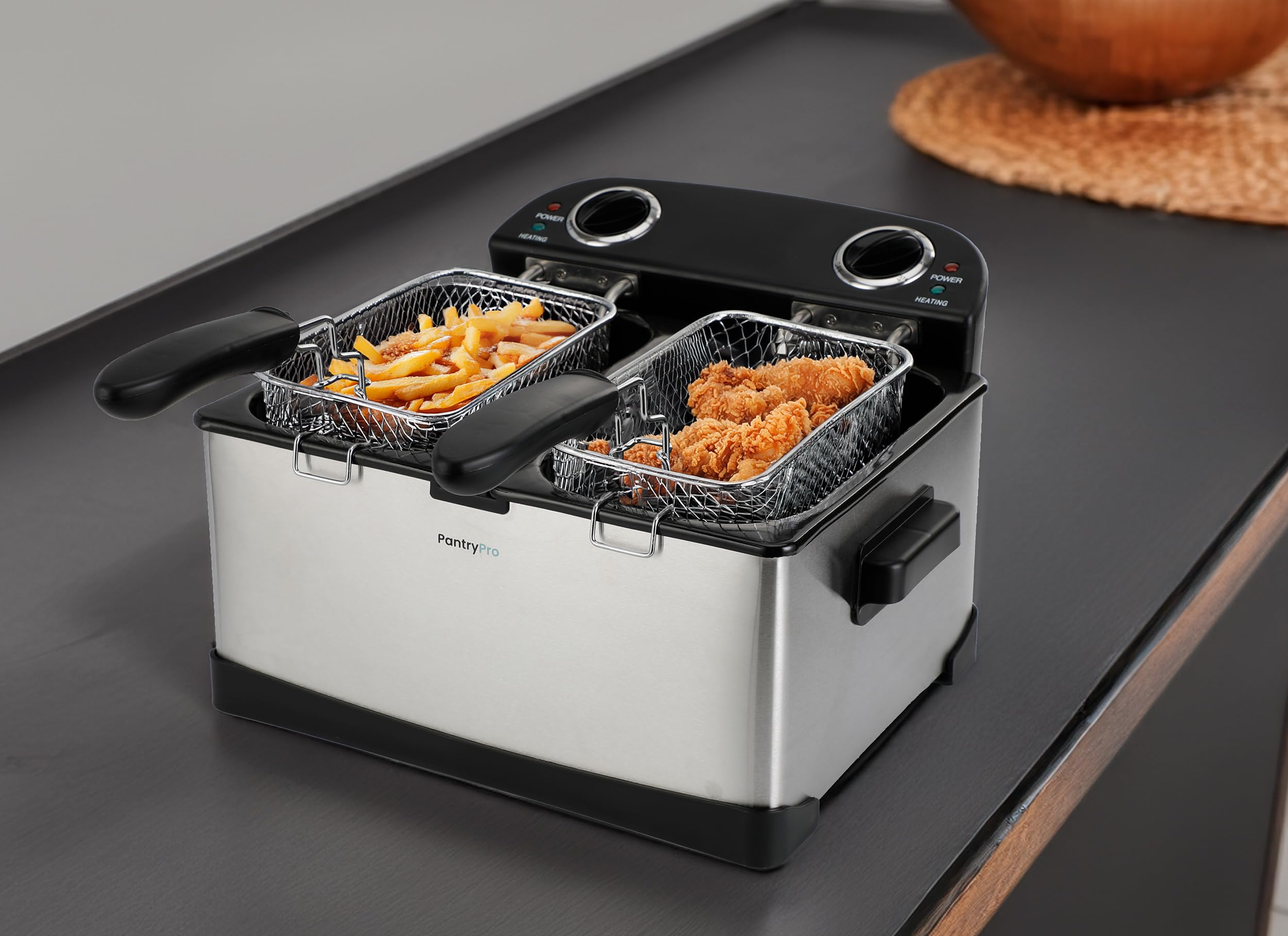 TheDisplayGuys controles-doble-temperatura permiten freír distintos alimentos al mismo tiempo.