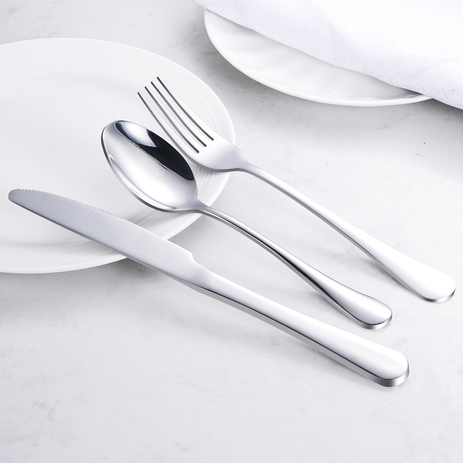 TININA cubiertos con peso ergonómico para equilibrio cómodo al comer.
