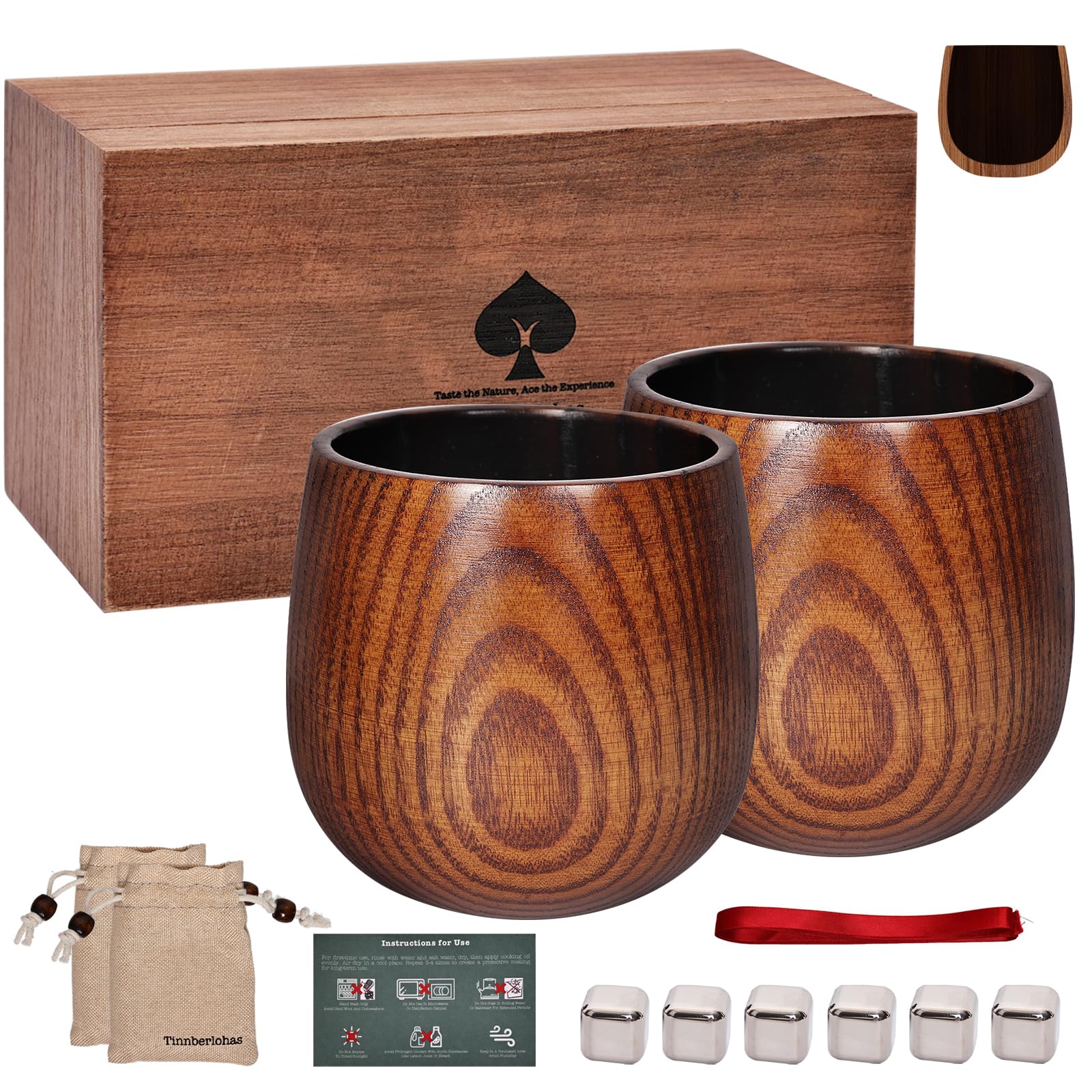 Vaso de whisky de Tinnberlohas con madera carbonizada, enfoque en interior para aroma más profundo