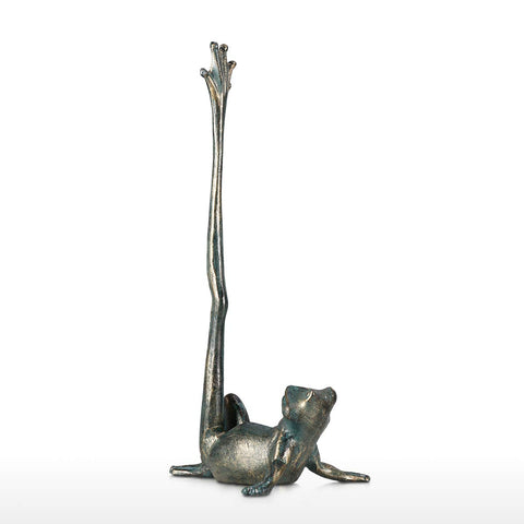 Tooarts sapo acabado bronce, detalle artesanal que decora la mesa.