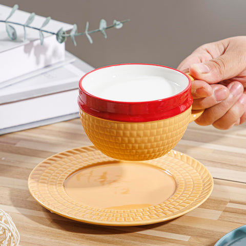 Tregoer taza con platillo, base estable y mango ergonómico para un agarre seguro.