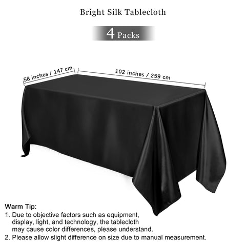 Mantel TURSTIN negro satinado con brillo suave para eventos nocturnos.