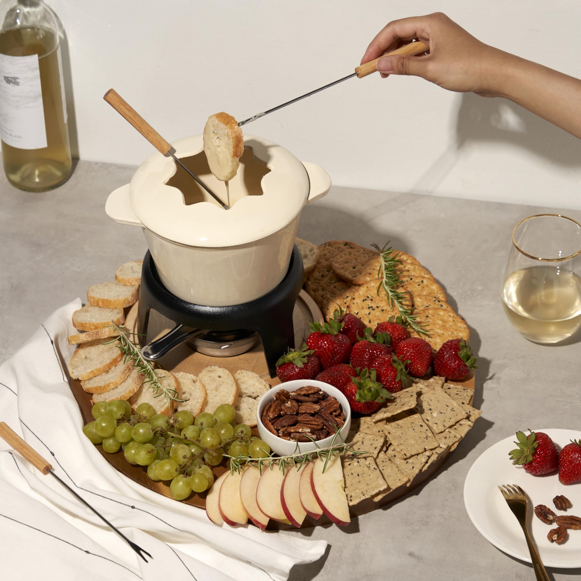 Twine fondue uso queso, fondue cremosa para compartir.