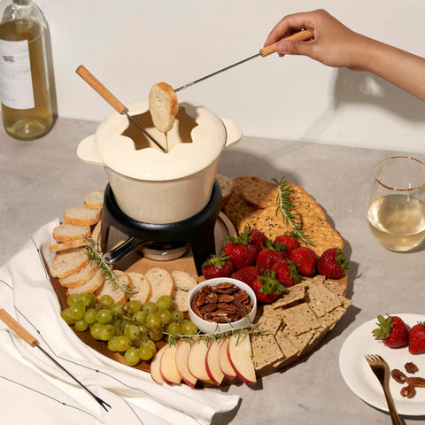 Twine fondue uso queso, fondue cremosa para compartir.