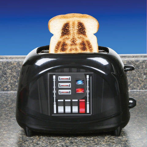 Tostadora Darth Vader de Uncanny Brands: casco Vader que salta al tostar, ideal para desayunos divertidos.