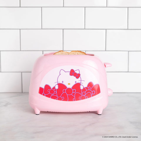 Tostadora Hello Kitty de Uncanny Brands, vista lateral, diseño compacto para cocinas modernas.