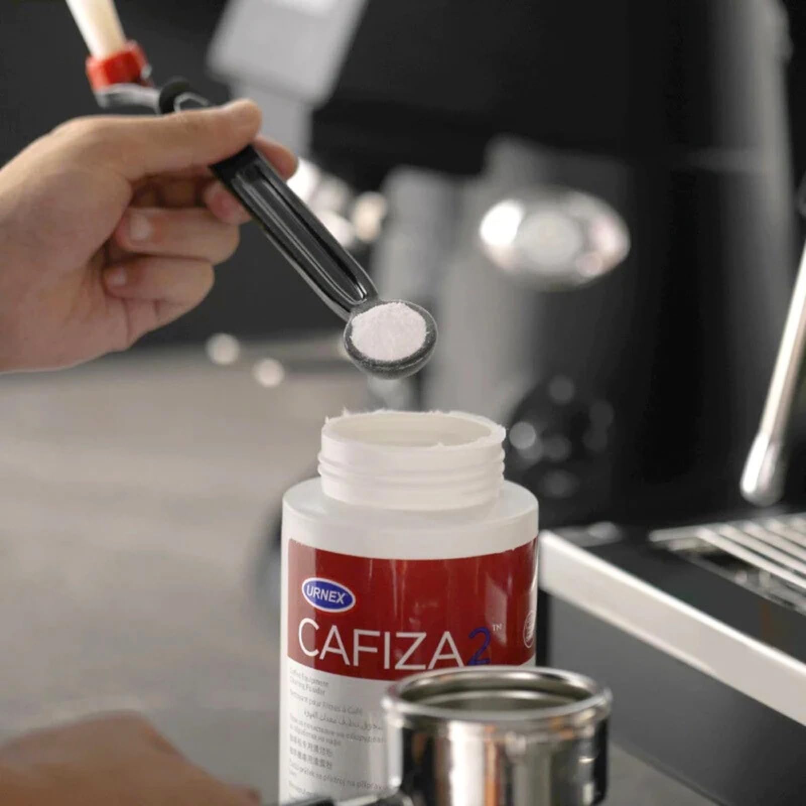 Urnex Cafiza compatibilidad metales NSF, seguro para acero y titanio.