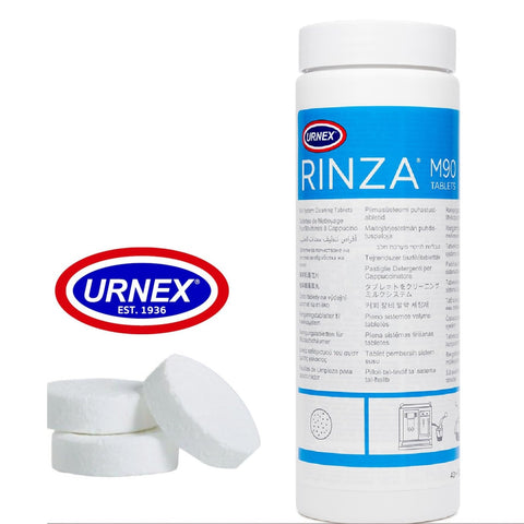 Urnex Rinza M90: tableta para disolver en agua tibia y eliminar residuos.