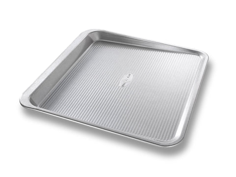 USA Pan: bandeja galletas deslizante para hornear de forma uniforme y fácil de liberar.