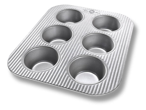 USA Pan bandeja muffin 6 tazas para horno tostador, facilita horneados rápidos y uniformes.