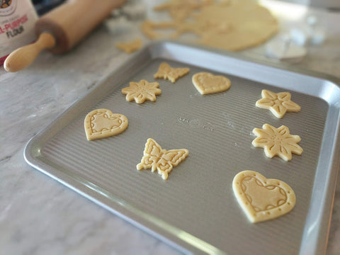 USA Pan: mango ergonómico para manejo seguro al sacar las galletas.