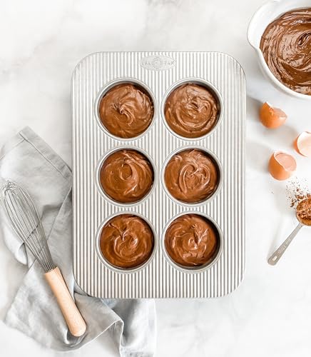 USA Pan recubrimiento antiadherente en muffins 6 tazas, liberación suave y limpieza rápida.