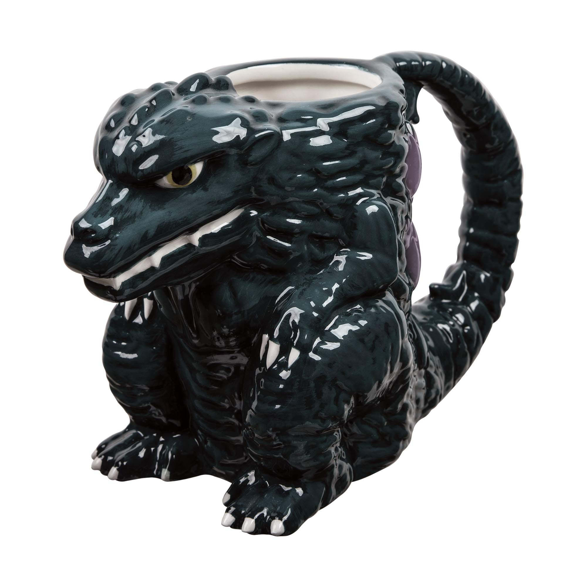 Taza Vandor Godzilla; detalle de diseño en cerámica, ideal para té relajante.