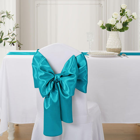 VCUSUELER mantel satinado azul verdoso en mesa de fiesta.