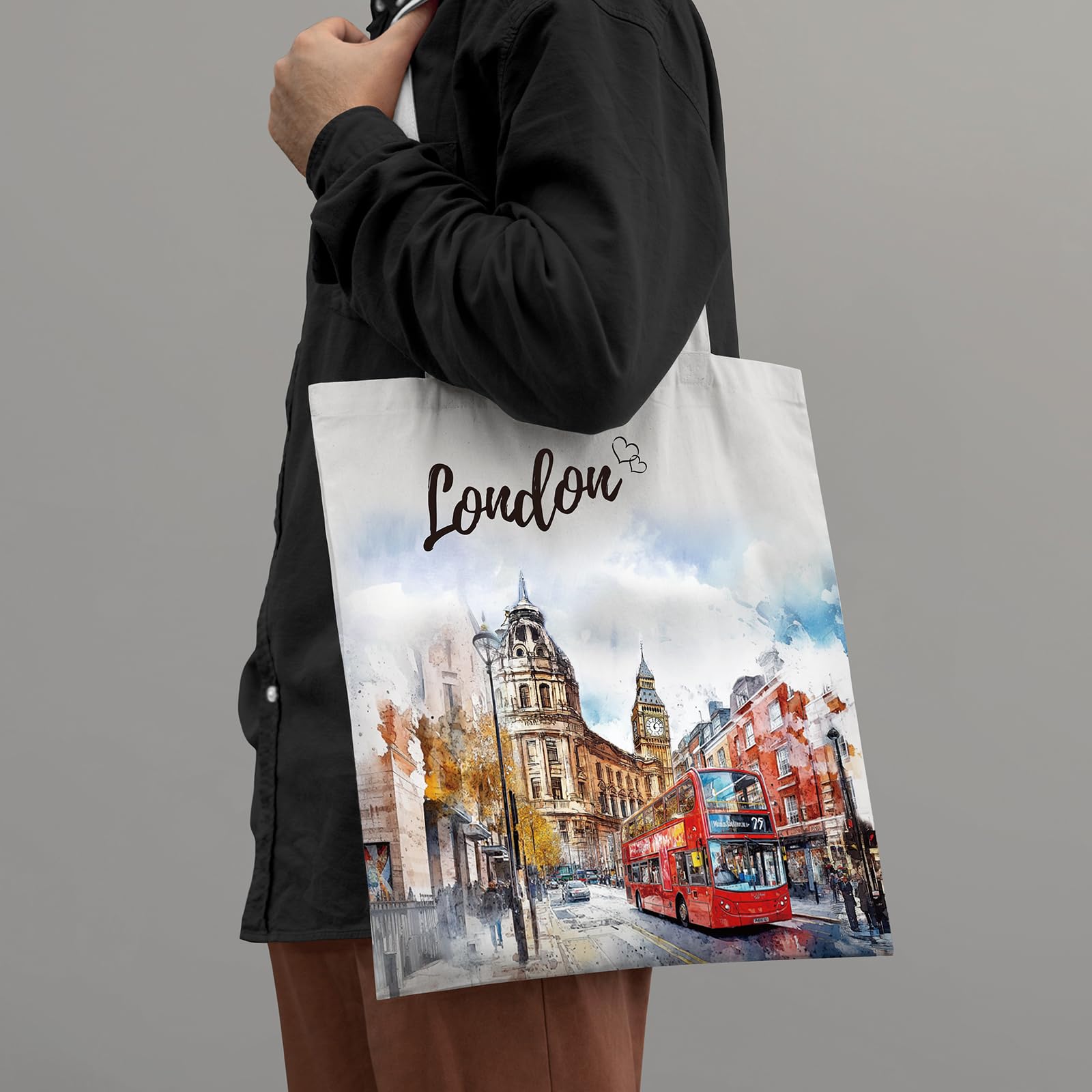 VeloKomo London tote con vacas Highland, diseño distintivo para looks casuales.