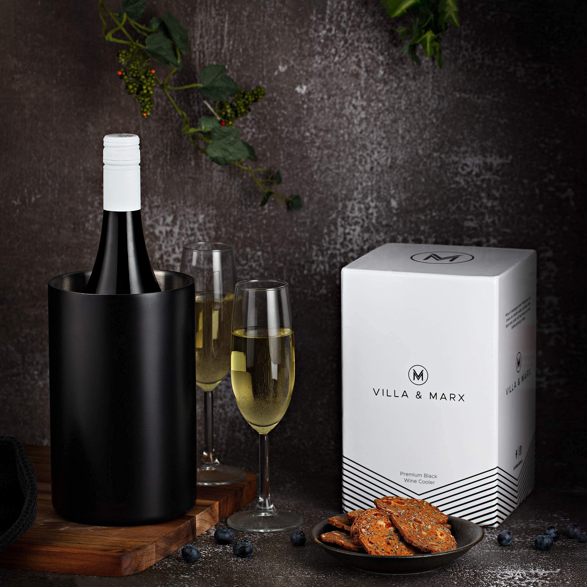 Villa & Marx balde champagne porta botellas, presentación elegante en mesa.