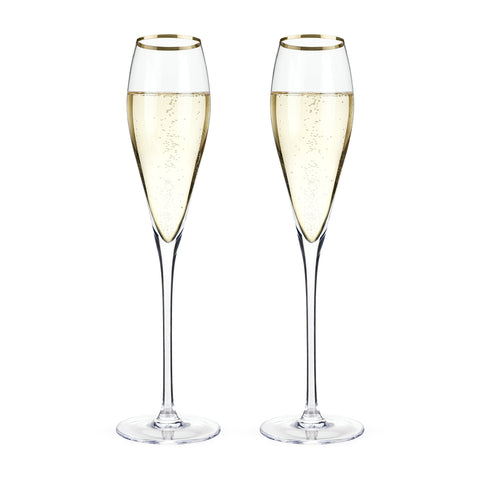 Viski copas champán cristal con borde dorado para brindis elegantes.
