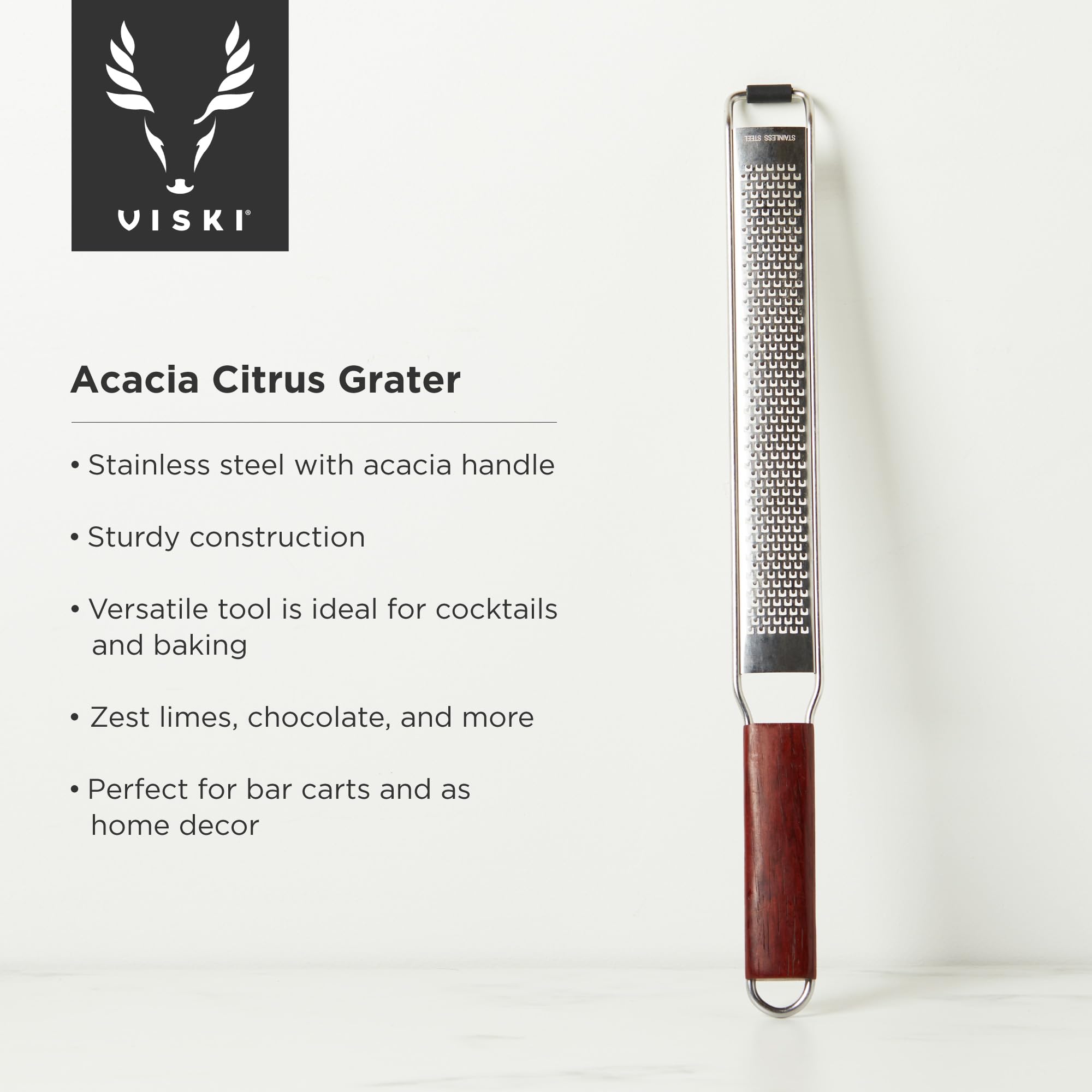 Viski rallador cítrico zesteado con acacia, perfecto para realzar la ralladura en cócteles.