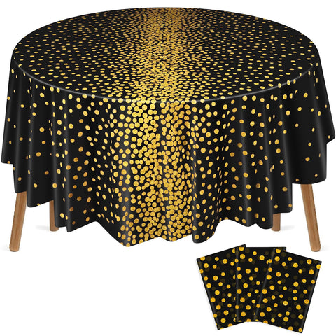Mantel VitalCozy redondo con lunares negro dorado, ideal para cenas elegantes.
