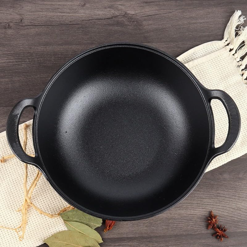 Wok VONOTO de hierro apto para horno, cocción uniforme.
