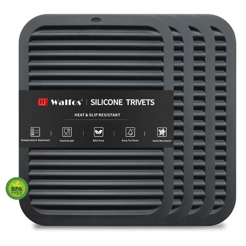 Trivets de silicona Walfos, set de 4 negros, protegen superficies al manipular ollas.