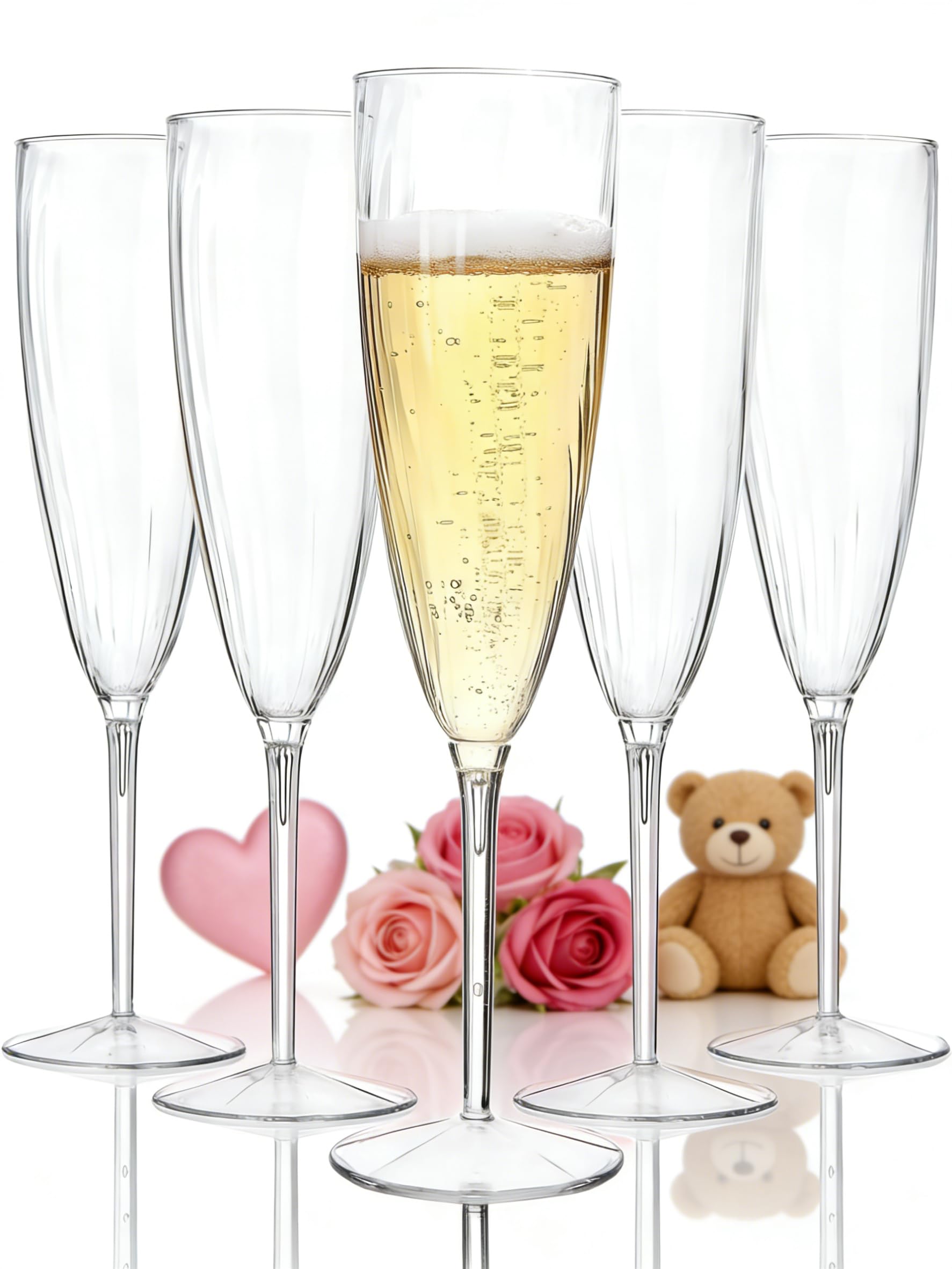 Copas WDF de champán plásticas claras para brindis, fáciles de desechar tras la celebración.