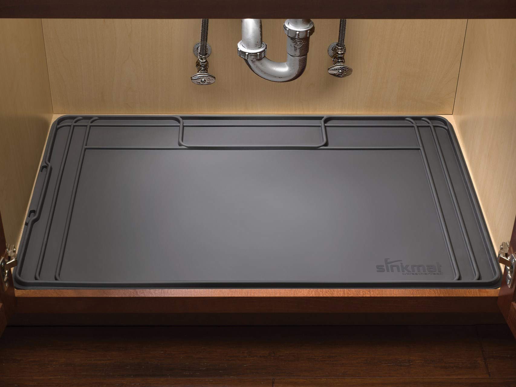 WeatherTech SinkMat muestra dimensiones 34-1-4 x 22-3-4 pulgadas para encajar.
