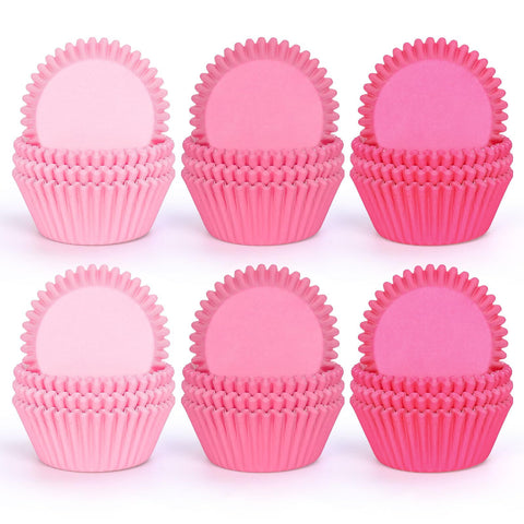 Whaline bases para cupcakes con gradiente rosa, ideales para decoración festiva.