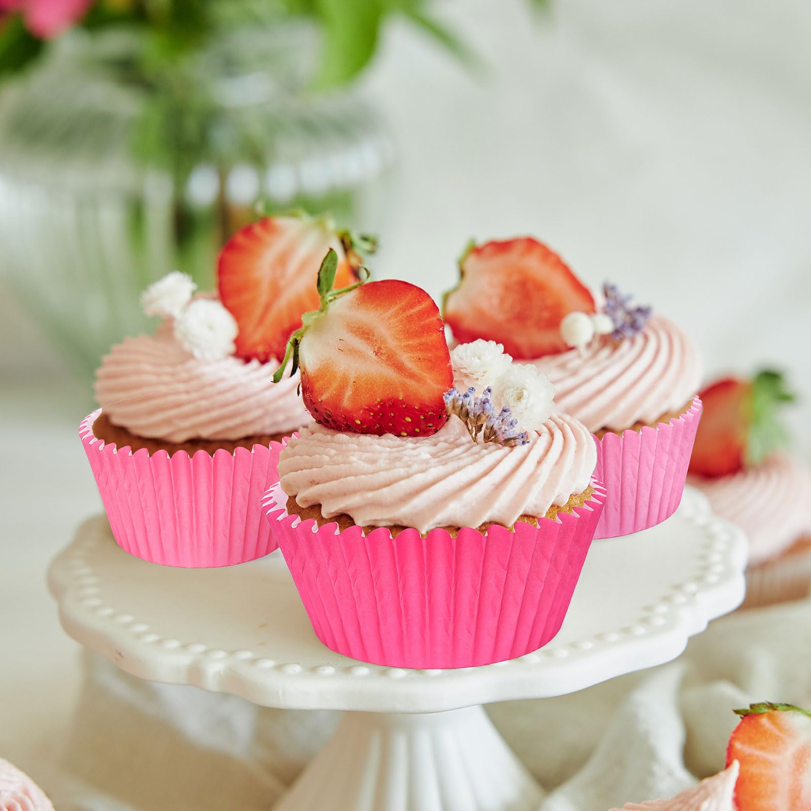 Whaline decoración de dulces con bases rosas para fiestas.