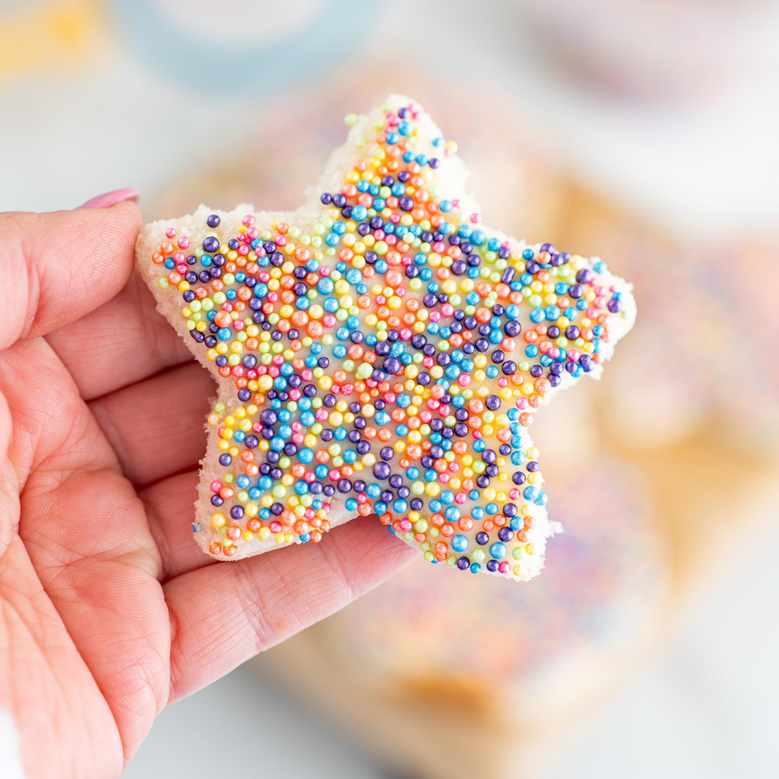 Cortador mariposa ergonómico Wilton para decoraciones comestibles atractivas.