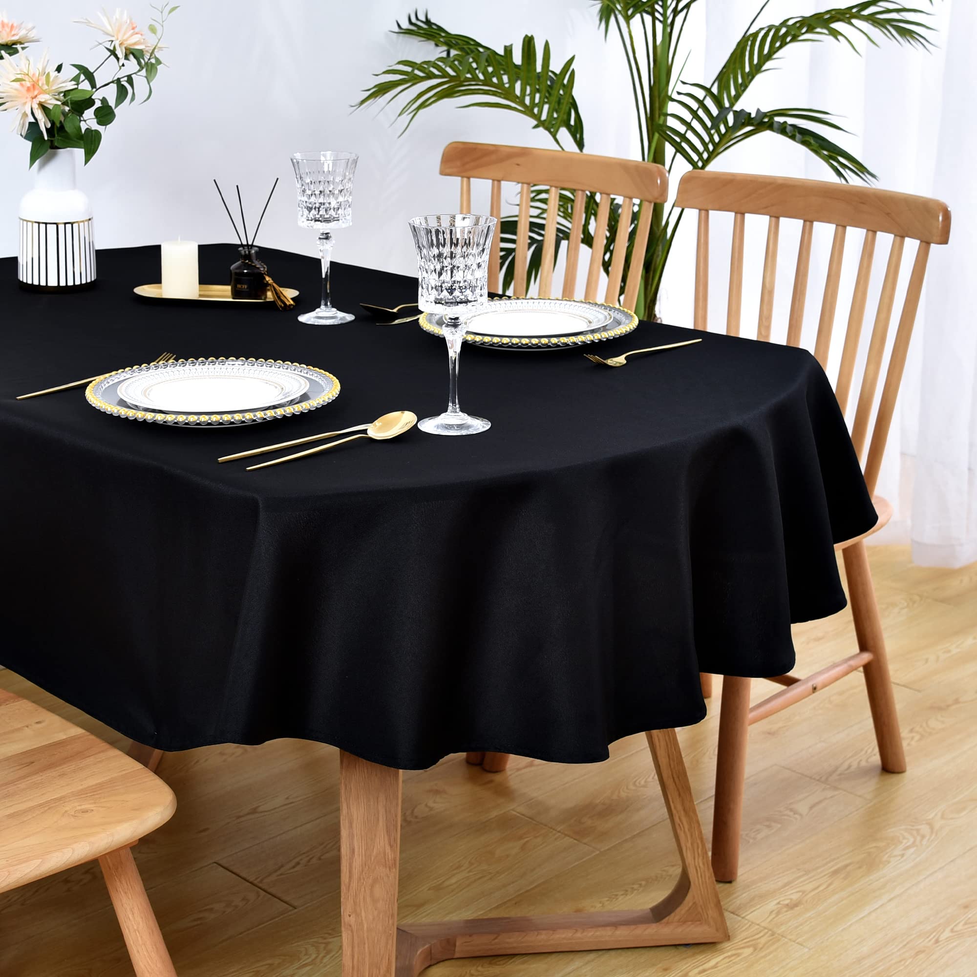 Mantel oval Wolkemer 60x84 negro protege la mesa y crea ambiente formal
