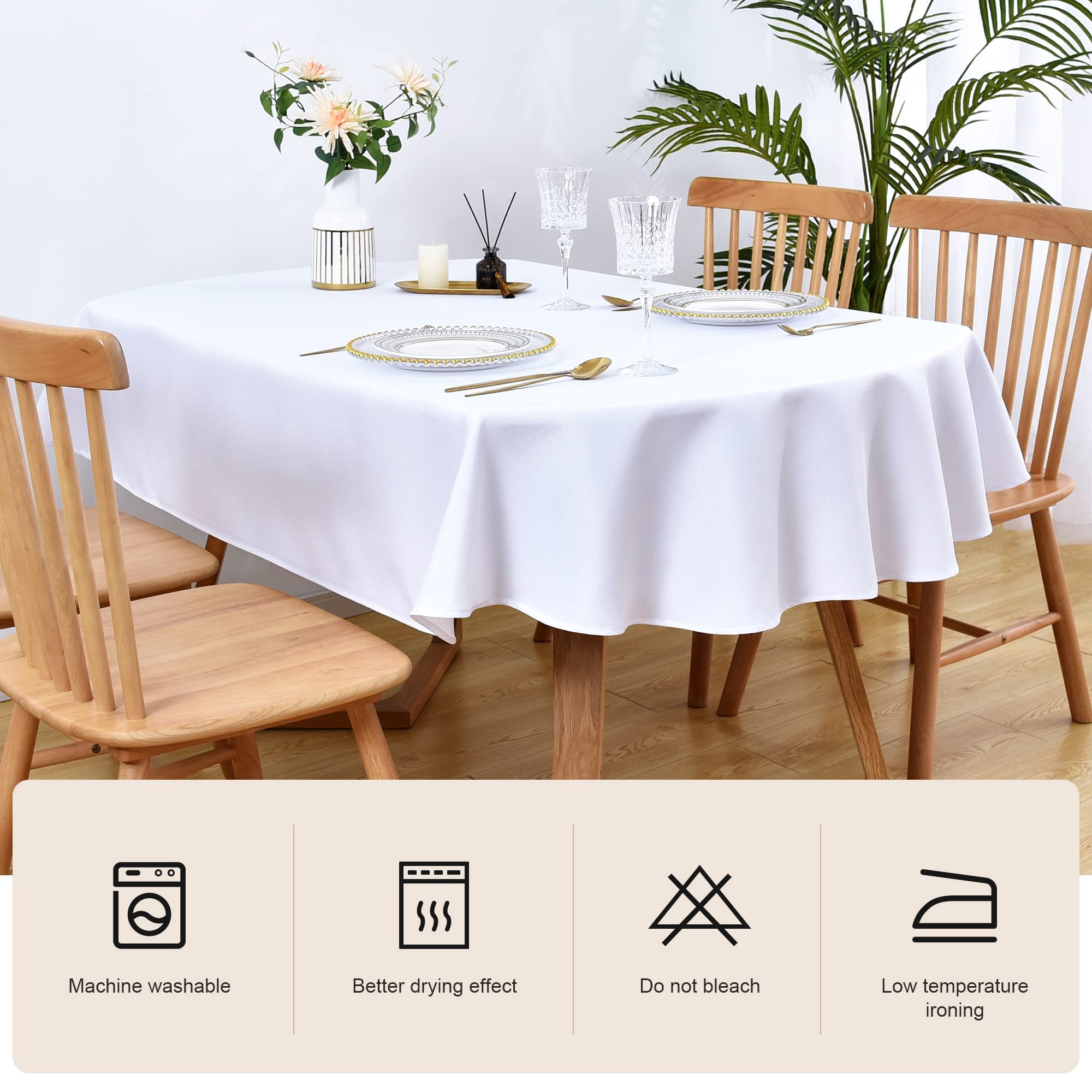 Caída suave del mantel oval Wolkemer que realza la mesa.