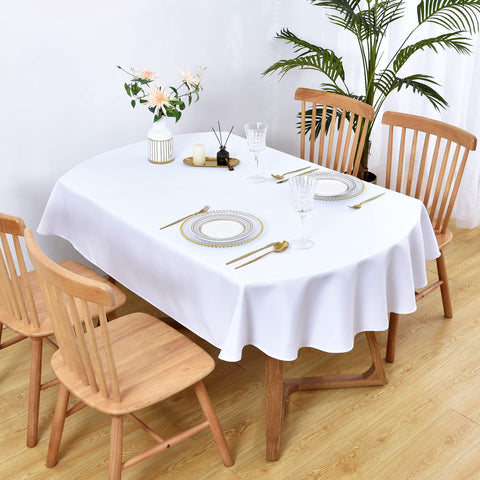Mantel Wolkemer ovalado blanco en mesa de comedor, mejora la atmósfera
