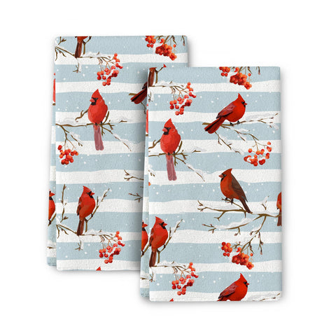 Toallas Wovoto con cardenales de invierno, textura suave y absorbente.