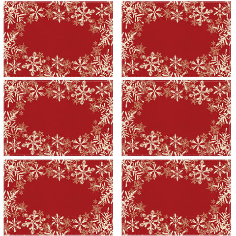 Mantel XCHI con copos rojos, ideal para crear ambiente festivo en cenas.